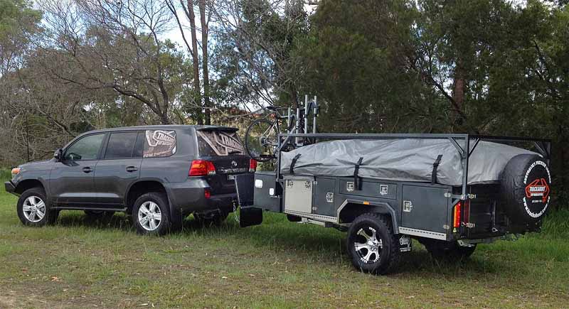 Example of an ISI 4x4x4 Off-Road Bicycle Carrier - Compact Beam used on a Trackabout Off-Road Camper Trailer