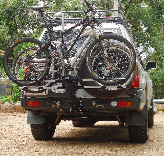 Example of an ISI Extreme Duty Extended-Length Bicycle Carrier with Low Profile Pivot Base used on a Nissan GU Patrol