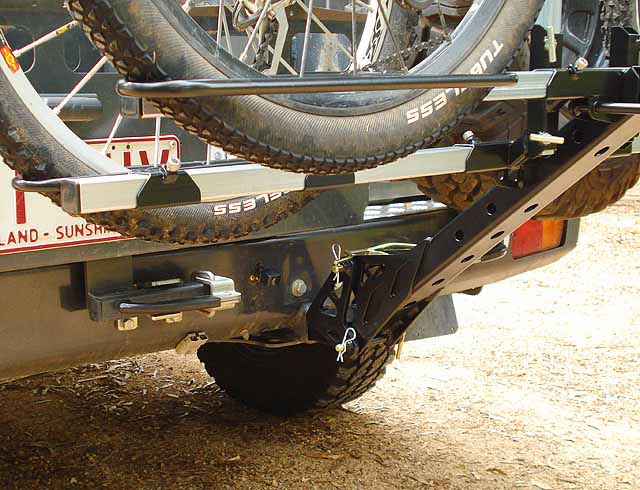 Example of an ISI Extreme Duty Extended-Length Bicycle Carrier with Low Profile Pivot Base used on a Nissan GU Patrol
