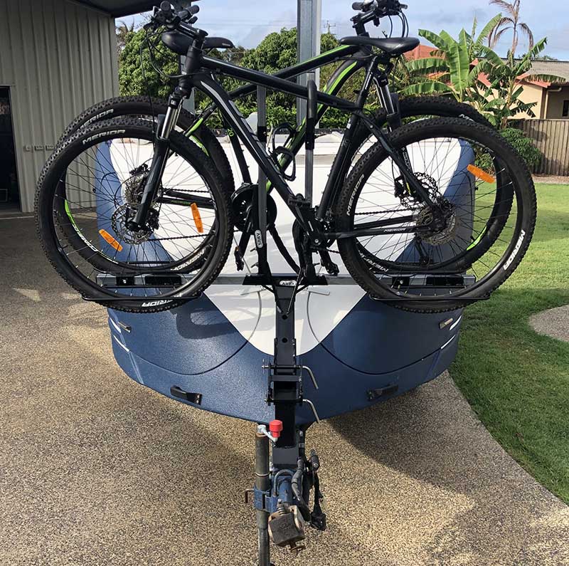 Bike Rack and Pivot Base for an Ultimate Camper