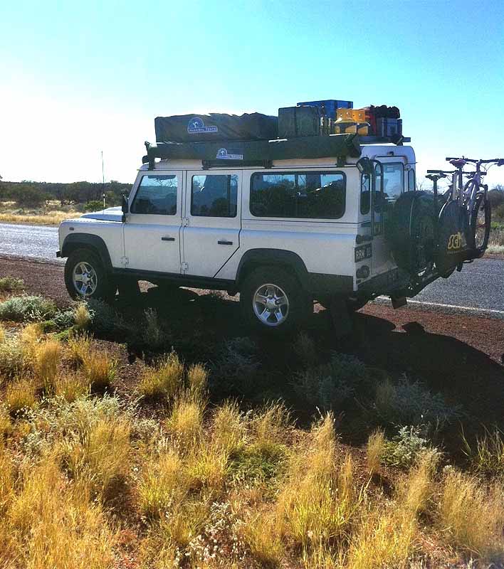 Example of an ISI Extreme Duty Extended-Length Bicycle Carrier with Low Profile Pivot Base used on a Land Rover Defender